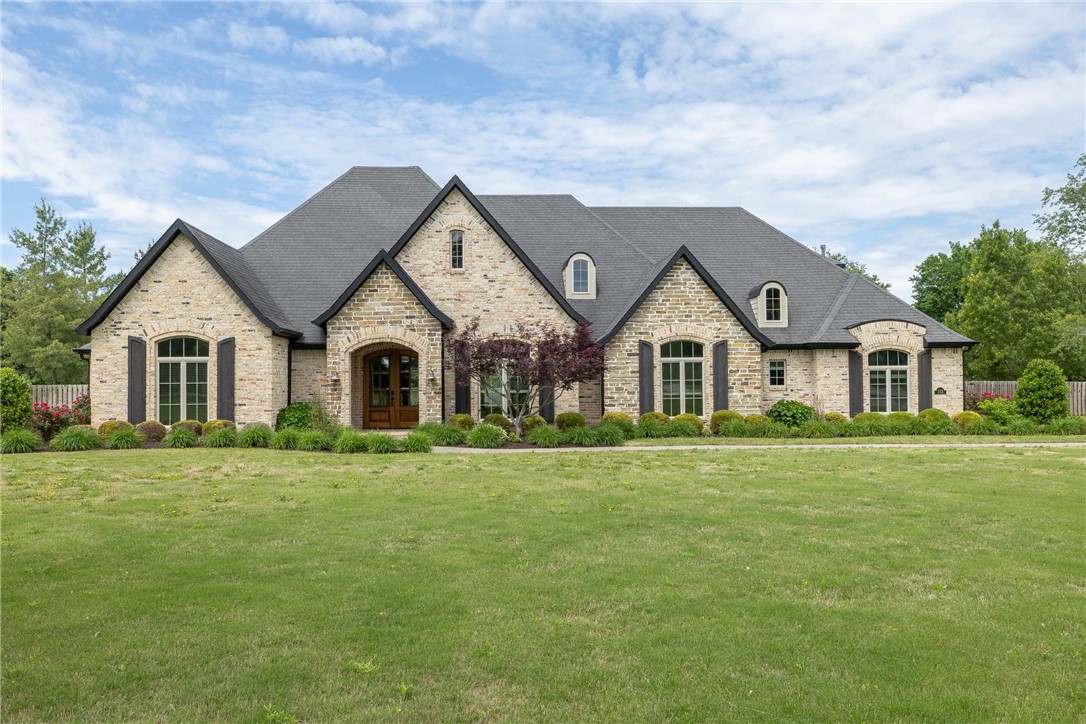 Stunning 5BR/4Ba home on 2 Acres with Pool and Elegant finishes.  Welcome to your dream retreat! Nestled on 2 beautifully landscaped acres, this home offers the perfect blend of luxury, space, and comfort.  Step inside to find handscraped real wood floors and soaring cathedral ceilings that create a bright, open ambience throughout the main living areas. This kitchen features granite countertops, stainless steel appliances and has an eat in kitchen. The spacious living room, anchored by a cozy fireplace, which flows into the dining room and out onto the back patio.  Enjoy the convenience of a main-level primary suite with a spa-like ensuite bath, along with 2 walkin closets with additional bedrooms that offer flexibility for guests, a home office, or multi-generational living. Outside, you'll find a peaceful setting surrounded by wide open space around the beautiful pool that creates a space for enjoyment and entertainment. Don't miss this rare opportunity to own a spacious, move-in ready home with acreage.