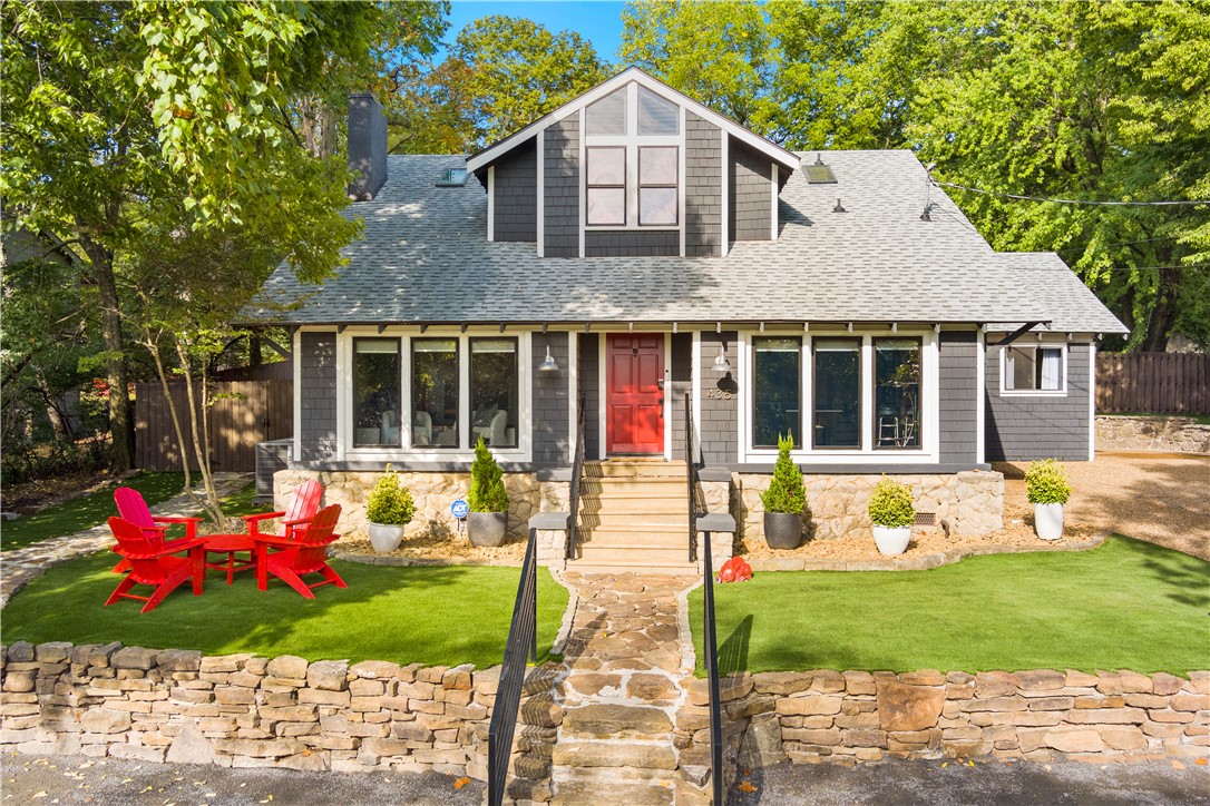 This fully renovated 1908 historic home is a proven, turn-key short-term rental property situated on a 0.31-acre lot just one block from Donald W. Reynolds Razorback Stadium and the University of Arkansas campus.

The 2,450 sq ft home features 4 bedrooms, 2.5 bathrooms, and charming vintage details paired with modern updates. Inside, you will enjoy a cozy gas fireplace, large living area, updated kitchen, and curated Razorback-themed decor for a fun atmosphere perfect for family and gatherings.

Another standout feature is the expansive backyard entertainment area, complete with a private pickleball court, 5-hole putting green, 6-person hot tub, and outdoor kitchen. It is an excellent space for entertaining and relaxing.

This fully furnished home is ready to enjoy in one of Fayetteville’s most desirable locations, ideal for homeowners, a second home or short-term rental investment.