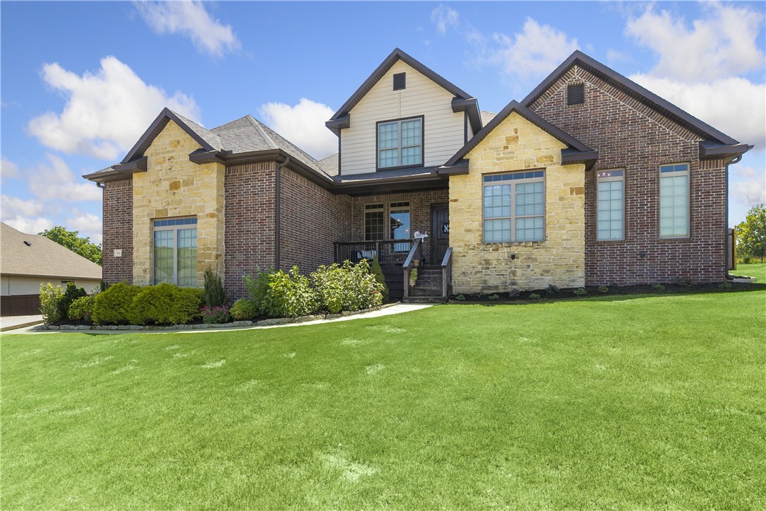 Beautiful home in the highly desired, family oriented Stone Mountain subdivision.  Gorgeous windows in every room bring in so much natural light.  The oversized five car garage, outdoor living area and the views behind us are second to none.  Built in safe room, Oversized office with kitchenette and full bath - perfect for a true home office.  Outdoor living space has all high end DCS appliances with ice maker.
