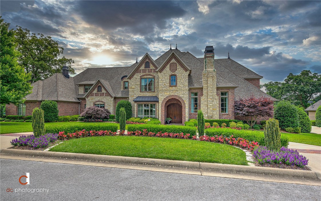 Exquisite Pinnacle Estate tucked away on a .73 acre lush setting with resort style backyard complete with heated pool, multiple covered patios w/ outdoor fireplace and built-in grill creating your own private retreat!  Showstopping chef’s kitchen with large island and bar with professional grade appliances all open to a sprawling great room that enjoys open views of the backyard paradise!  Main level master retreat is grand and offers a luxurious en suite bath and closet fit for a queen!  Formal dining, private study, fully equipped media room, game room, two bedrooms on the main level, laundry room on each level!  Gorgeous curb appeal with front circle drive and side load 4 car garage. Welcome home to luxury living in the heart of Northwest Arkansas just minutes from shopping, restaurants, Walmart Amp, trails, hospital and more!