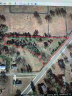Vacant land that is ready for a new house to be built on. Not far from the public school.