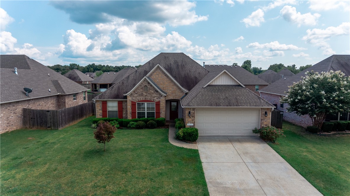 Great location close to Holcomb Elementary School, Holt Middle School, Gary Hampton Park, one block from Fayetteville trail system that connects to the Razorback Greenway, and only minutes to I49.  Split floor plan.  Attic fan, granite countertops, wood laminate flooring in living room and master bedroom, tile flooring in the kitchen, baths, and breakfast are.