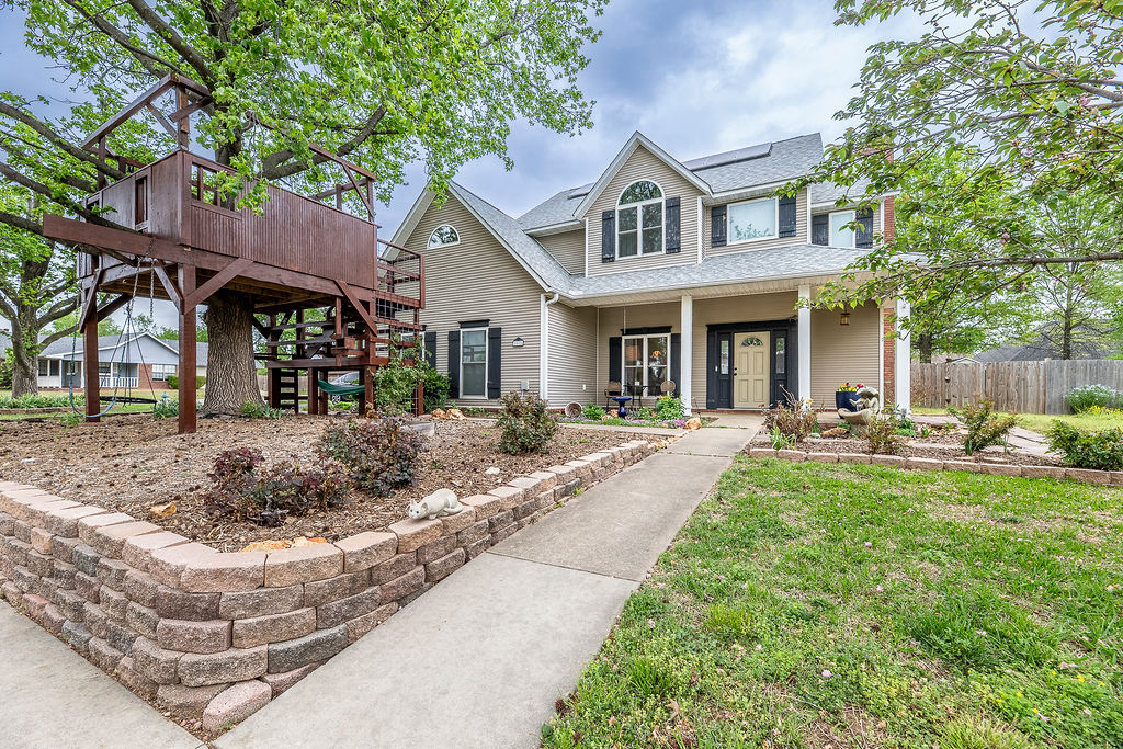 Beautifully updated 4BR/2.5BA home with 2,467 sq ft, priced accordingly. Extensive upgrades throughout; sellers completed nearly all planned improvements. New roof (post-tornado), new windows, attic insulation, lighting, decking, privacy fence, landscaping, garage loft, fiber optic line, PRV, and new sewer line from street to home. Electrical upgrades include new solar line, 200-amp meter base conversion, and added exterior runs. Energy efficient with 11.2 kW solar system. Outdoor living includes rebuilt pool and patio (2022), 200’ French drain, soaker hoses, and water line to grape arbor. Kitchen appliances all under 3 years old: stove, dishwasher, refrigerator, dual cook oven. Upstairs hall bath fully updated with tile, granite, fixtures, shower. Custom treehouse adds charm. Quarterly pest control and routine HVAC/plumbing maintenance. Prime Rogers location. Preferred lender offers up to $6,000 toward closing costs and/or rate buy-down. Seller offers up to $2,500 toward closing costs or rate buy-down.