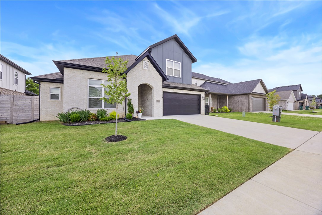 Welcome to this stunning 2025-built home offering 4 bedrooms, 3 bathrooms, and 2,125 square feet of thoughtfully designed living space. The open floor plan features luxury vinyl plank flooring in the main living areas, soaring 10-foot ceilings, and abundant natural light.

The living room showcases a modern electric fireplace with a stylish tile surround, while the kitchen impresses with an oversized island, additional cabinetry, and ample storage for everyday living and entertaining.

The main level includes 3 bedrooms and 2 bathrooms, while upstairs offers an additional bedroom and full bath. Designed for comfort and convenience, the home features a walk-in tub/shower, grab bars, a raised-height toilet, and wider passageways throughout much of the home.

Enjoy added privacy in the backyard which backs up to trees with no rear neighbors. The adjoining property is also available for purchase, creating a unique opportunity for extended family, friends, or investors seeking neighboring homes.