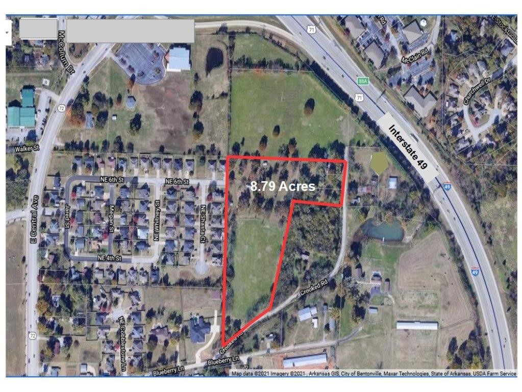 8.79 acres of level to gently sloped land that is adjacent to land fronting on I-49 in NE Bentonville. Presently zoned Agricultural and has a modular home and outbuildings.  All utilities nearby.  Owners want to sell with the 12.69 adjoining acres, see MLS #'s 1180334 and 1180338.