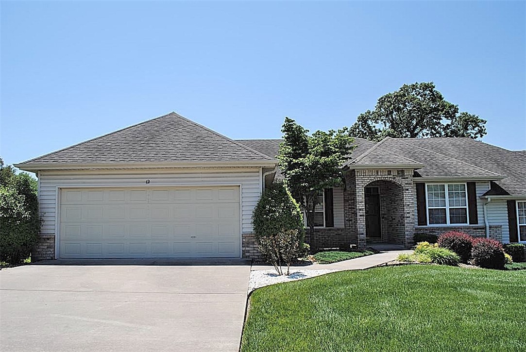 1 level, 1 owner town home with large yard. 2 bedrooms, office and sun room. The garage has storage and a utility sink. The nice back deck has a remote controlled awning. Expanded plan with larger laundry, master bedroom closet and dining area. Nice sun room overlooks large grassy yard. Gas log fireplace in living room. Washer, dryer and refrigerator convey. Available for a quick close.  Monthly fees include all outside maintenance. Nice clubhouse and outdoor pool.