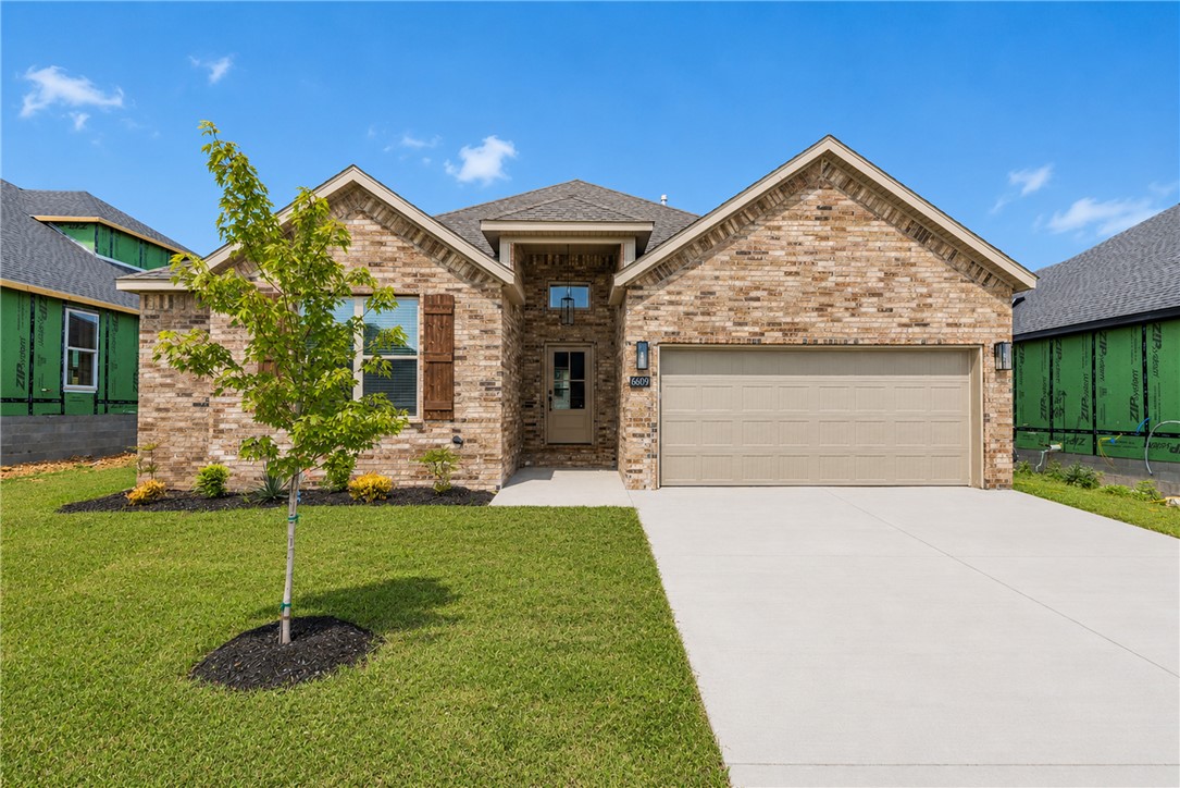 Welcome to this stunning all-brick new construction home in Walnut Grove Estates. This Bentonville subdivision is located just minutes from Vaughn Elementary, the airport, groceries, gas, & more! It boasts numerous high-end features and extras. Inside, you'll find a stone fireplace with built-in shelves on both sides, a spacious pantry, an eat-in kitchen with stainless steel appliances, and a master bathroom featuring a fully tiled walk-in shower with a rain head, bench seat, soaker tub, & dual vanities. The property also includes 2-inch faux wood white blinds, gutters, and a privacy fence. Neighborhood pool & other POA amenities coming soon.