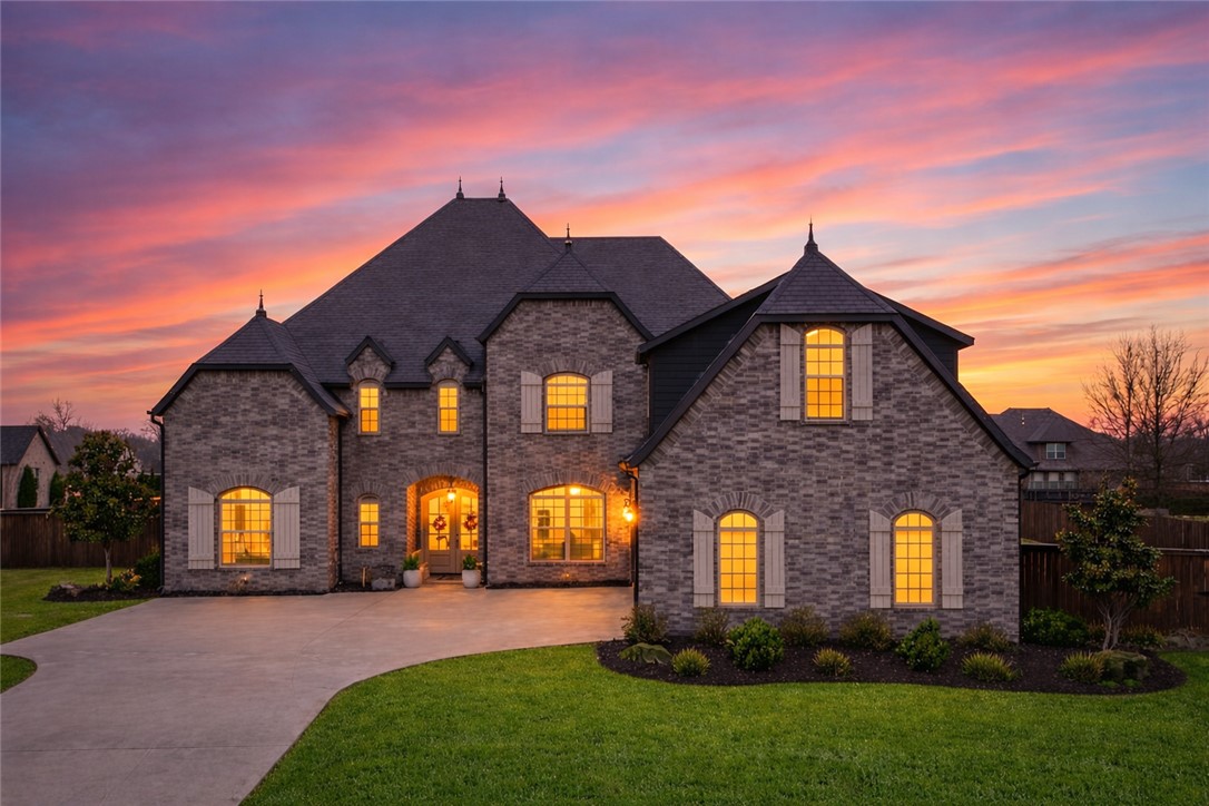 Remarkable custom builder's home where craftsmanship and designer details meet effortless luxury living. Every inch of this 5,000+ sq. ft. masterpiece is thoughtfully appointed, from the spacious eat-in kitchen with oversized pantry and custom Butler's Pantry, to the primary suite retreat with its abundant windows, and rolling-ladder closet built for real life. A dedicated Media Room and sprawling Bonus/Rec Room with wet bar anchor the home's entertainer credentials. Four bedrooms with a total four and a half baths give you an ensuite in every bedroom. This three-car garage and premium lot is in one of Cave Springs' most sought-after large-lot communities! Step outside to outdoor living that matches the interior's feel and look complete with auto shades across the patio.  There's also a tornado shelter built into the garage! This rare Ridgewood home brings both the WOW and the warmth of this special community! New outdoor kitchen, updated flooring, updated kitchen, and 2 new HVACs.