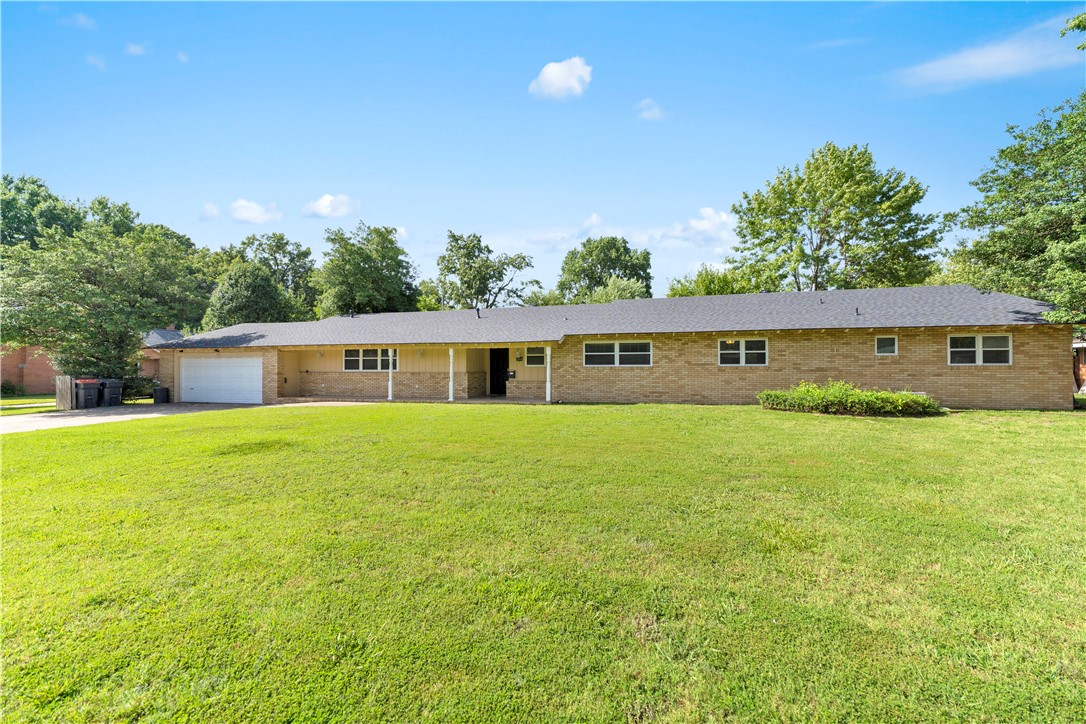 This 3,606 square feet, 5-bedroom, 3.5-bath home features a versatile layout designed for comfortable everyday living and entertaining.  
Discover this spacious single-story brick home situated on a level 0.65-acre lot in a quiet, established Springdale neighborhood. 
The custom kitchen showcases granite countertops, a 6-burner gas cooktop, double stainless-steel ovens, built-in microwave, soft-close cabinetry, and abundant workspace. Two fireplaces add warmth and character, while generously sized bedrooms with walk-in closets provide exceptional comfort. Recent updates include a newer roof and HVAC system. Enjoy mature trees, a spacious backyard, and a convenient location just minutes from schools, shopping, medical facilities, parks, the library, dining, Downtown Springdale, and major commuter routes. This home offers the perfect blend of space, comfort, and convenience.