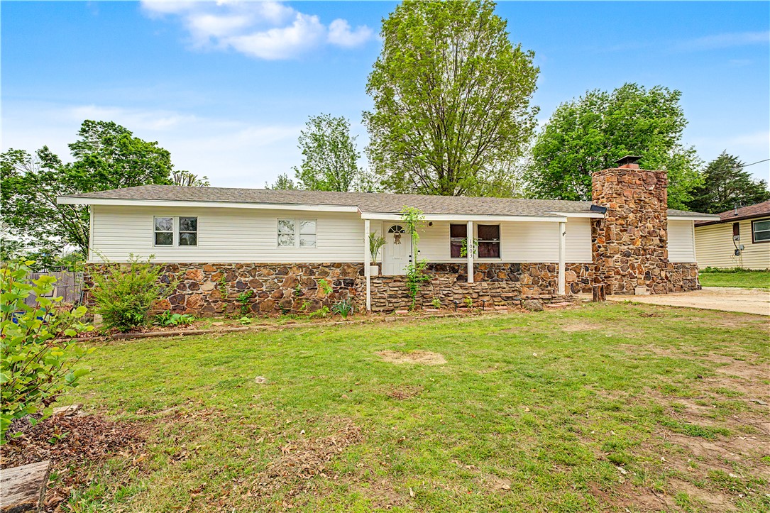 Situated on a generous 0.35-acre lot in the heart of Bentonville, this property offers an incredible opportunity to own in one of Northwest Arkansas' most desirable and rapidly growing areas. Just minutes from Downtown Bentonville, the vibrant Bentonville Square, local restaurants, shopping, entertainment, parks, trails, and the new Walmart Home Office, you'll enjoy unmatched convenience and accessibility.

The spacious yard provides plenty of room to relax, entertain, garden, or create your own outdoor retreat. The 0.35-acre lot offers endless possibilities and added privacy while still being close to everything Bentonville has to offer.

Whether you're looking for a primary residence, an investment property, or a home in one of Northwest Arkansas' most sought-after locations, this property offers the perfect blend of comfort, convenience, and future potential. Don't miss your chance to own a piece of Bentonville!