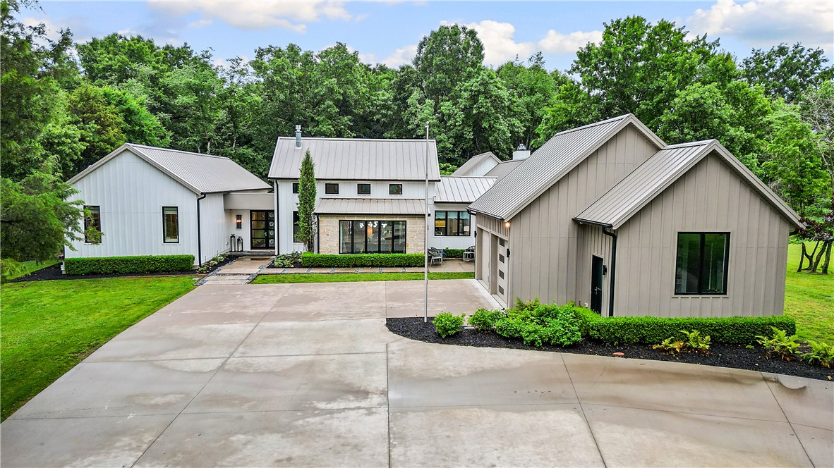 Tucked away on 2.08 secluded wooded acres, this one of a kind custom estate offers luxury living at its finest. Built in 2018, the 4,688 SF home features expansive living spaces, oversized bedrooms, massive walk-in closets, a beautiful glassed in sunroom, and a resort inspired backyard complete with an in-ground pool and shed. A rare opportunity to own an exceptionally private property just minutes from Fayetteville amenities.