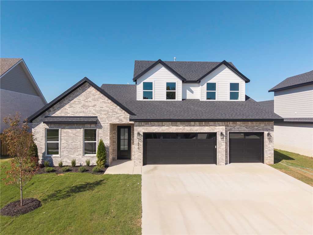 Step into comfort and style with this 4-bedroom, 3-bath home offering a layout designed for everyday living. The main level features a spacious primary suite along with a secondary bedroom and full bath—perfect for guests, a home office, or flexible use. Upstairs includes two additional bedrooms and a full bath. The kitchen is thoughtfully designed with granite countertops, custom cabinetry, stainless steel appliances, and an eat-in dining area. Enjoy open-concept living with luxury vinyl plank flooring in the main areas and enhanced lighting throughout. Located in a growing community with amenities in progress, including a pond with walking trails, a clubhouse, and a pool. Conveniently situated less than 20 minutes from Downtown Bentonville and the new Walmart Home Office, and under 15 minutes to XNA. Available for lease—schedule your showing today!