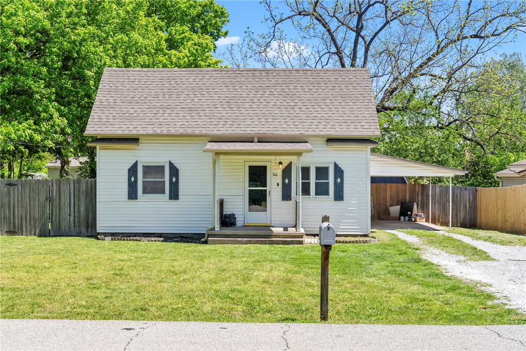 Welcome to this charming 4-bed, 2-bath home in Centerton, located in the highly desired Bentonville School District and priced under $265,000—an excellent opportunity for first-time buyers or investors. Inside, you’ll find a warm layout with recent updates. The kitchen features freshly painted cabinets that brighten the space, while durable LVP flooring runs throughout the main living areas with tile in both bathrooms for easy care. The home offers established charm with a solid, livable foundation ready for your personal touch. Upstairs, two loft-style bedrooms add a unique and flexible space—perfect for bedrooms, an office, or hobbies. Outside, enjoy a large, flat, fully fenced backyard ideal for pets, play, gardening, or future entertaining. With its location, price, and potential, this Centerton home is a standout value with room to make it your own.