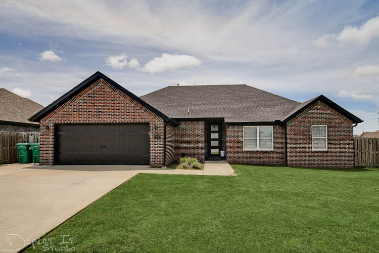 4 bedroom, 2 bath well-maintained all brick home in a desirable Centerton location in Sunrise Ridge Neighborhood! This home offers a nice open concept layout with a split floor plan for added privacy and modern finishes throughout. Beautiful tile wood flooring runs through the main living areas, with bedrooms thoughtfully separated. The kitchen and living space flow seamlessly, creating an easy, functional layout for everyday living with great natural light. The garage features an epoxy-coated floor for a clean, finished look. Located near Bentonville West High School and Gamble Elementary, with easy access to I-49 and just a short drive to Coler Mountain Bike Preserve, Walmart HQ, Downtown Bentonville, and XNA airport!