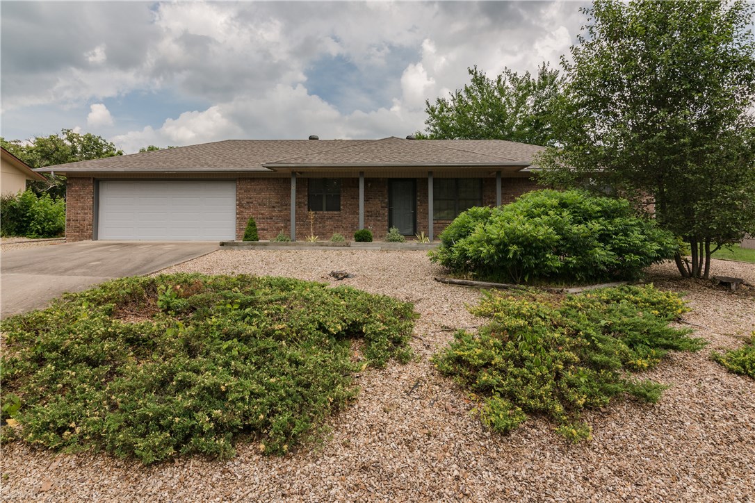 Neat clean, move in ready! Split plan with easy care landscaping in front and level backyard. Upgrades include newer Trane Heat Pump, garage door in 2013, roof in 2014. Newer laminate and tile. Seller is hooking up to sewer prior to closing. Great for starters or investors.