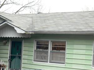 Large 2 bed 1 bath located on a large corner lot; home is being sold as is and will be offered at auction on March 25th.