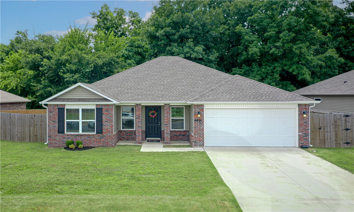 Why wait months for new construction when you can move right in? Fresh interior paint, luxury vinyl plank flooring, and a brand new stove/oven make this home truly move-in ready. The kitchen also features a vented range hood with exterior exhaust.
The true highlight is the private, fully fenced backyard. Framed by mature trees, it offers a peaceful retreat that's hard to find. Sip your morning coffee on the covered front porch, entertain with ease, or simply enjoy your own secluded outdoor space. The neighborhood playground adds even more to love.

Whether you're looking for your next home or a smart investment opportunity, you'll appreciate the unbeatable location just minutes from 
I-49, Walmart Home Office, XNA Airport, JB Hunt, Tyson, Mercy, Downtown Bentonville, Crystal Bridges, The Momentary, Coler, Slaughter Pen, Osage Park, shopping, dining, and more.