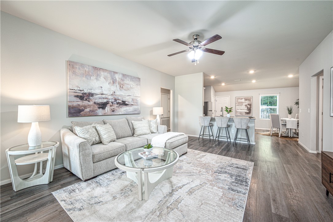 Why wait months for new construction when you can move right in? Fresh interior paint, luxury vinyl plank flooring, and a brand new stove/oven make this home truly move-in ready. The kitchen also features a vented range hood with exterior exhaust.
The true highlight is the private, fully fenced backyard. Framed by mature trees, it offers a peaceful retreat that's hard to find. Sip your morning coffee on the covered front porch, entertain with ease, or simply enjoy your own secluded outdoor space. The neighborhood playground adds even more to love.

Whether you're looking for your next home or a smart investment opportunity, you'll appreciate the unbeatable location just minutes from 
I-49, Walmart Home Office, XNA Airport, JB Hunt, Tyson, Mercy, Downtown Bentonville, Crystal Bridges, The Momentary, Coler, Slaughter Pen, Osage Park, shopping, dining, and more.