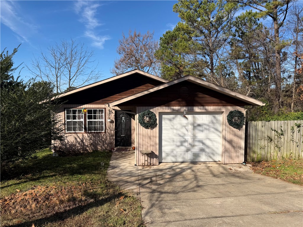 This 3 bed 2 bath 2 story home is an excellent opportunity to own your slice of the stunning Ozarks! View every season from one of the best vantage points in Northwest Arkansas. Home sits on an oversized lot with large back deck. Located just around the corner from Prairie Creek Marina or the Beaver Shores Boat Ramp. If you love the water, you're 2 minutes from the lake.  Inside you'll love the large room sizes, layout, and nice bathrooms. This property needs some work but it’s an ideal starter, airbnb, seasonal, or investment property. Schedule your showing today.