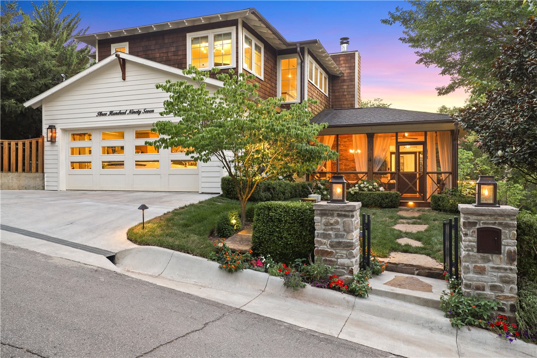 Loads of Awesomeness in this pristine custom remodeled downtown Mt. Sequoyah home.  There is everything from custom lighting throughout downstairs, two fireplaces inside, and beautiful hardwood floors throughout the house. Kitchen has two dishwashers, a butler's pantry with 172 bottle wine fridge plus a gorgeous island in the kitchen.  Too many features to list.  Outdoor pool with endless swim machine,hot tub, custom rock patio, and walkways with tons of outdoor lighting.  Pergola over the outdoor kitchen equipped with gas grill, pizza oven, wine fridge and outdoor fireplace.  60x10 Bocce court and fencing.  There is a custom screen porch with a mirrored wall plus heaters for enjoying the colder nights.  Tons of storage, many closets and much built-in cabinetry just add to the many well-thought-out features of this home. Call for the attached amenity list.