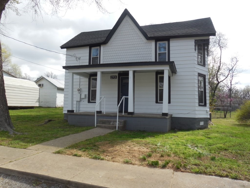 Cute! Cute! Cute! 1911 2-story charmer featuring wood floors, recent roof, double pane windows, central heat & air. Loads of charm & character in this gem. Quiet side street & walk to downtown. Master is down, guest beds up.