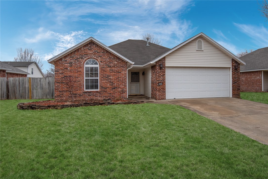 Charming home in quiet neighborhood near Lake Sequoyah! Beautiful hardwood flooring in living room warms the large space. Angled ceiling and fireplace add unique touches. Kitchen is complete with wine rack and plenty of counter and storage space. Dining space is bright and open. Master bedroom features recessed ceiling for a more spacious feel. Full bathrooms provide plenty of counter space and storage.