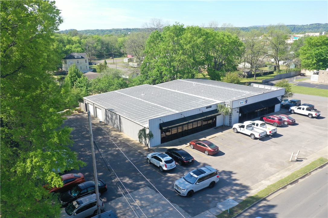 Discover this income producing commercial package located along a high traffic roadway just minutes from downtown and ATU. This fully occupied strip mall features a total of 5 suites, and 3 of them secured with 5 yr leases, offering stable long term rental income from established tenants. In addition to the commercial frontage, the property includes 4 rental houses, all currently leased, creating multiple streams of revenue and strong occupancy history. Its location ensures excellent visibility, consistent traffic flow, and proximity to surrounding businesses, neighborhoods, and student populations