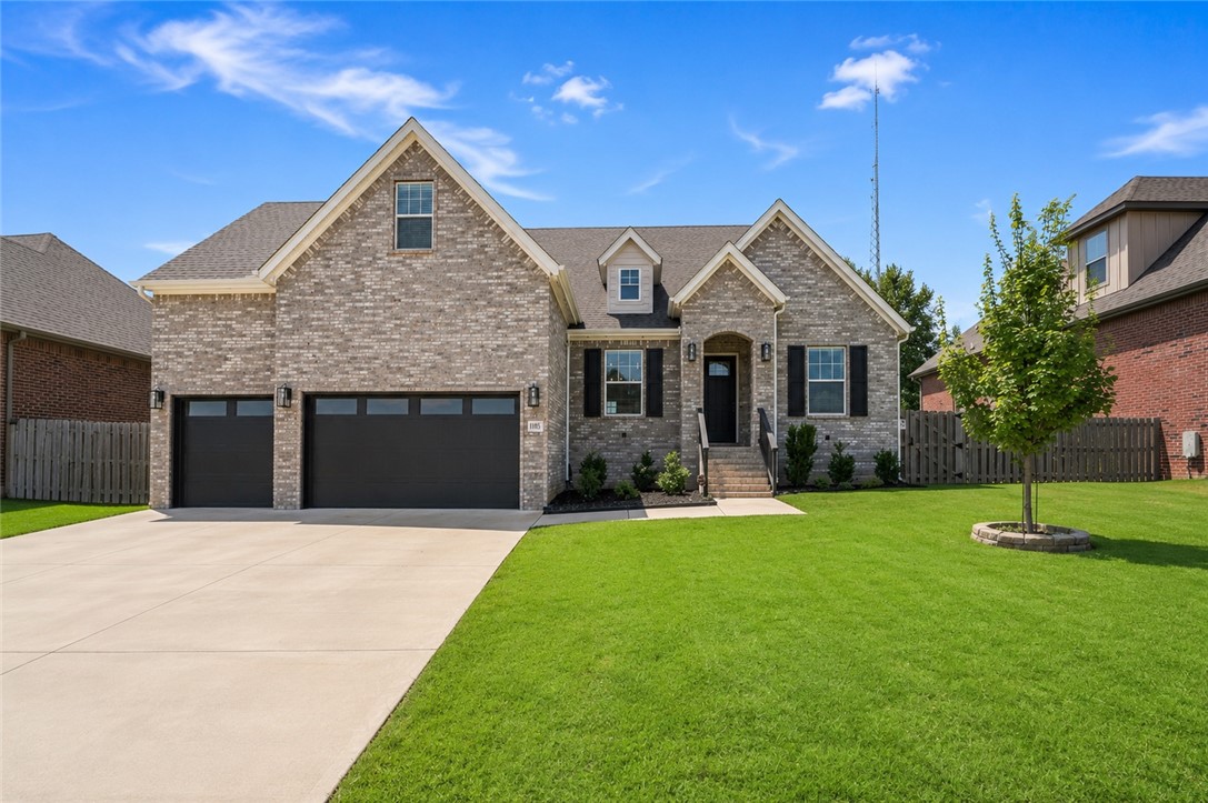 Luxury, space, convenience, and exceptional value come together in this beautifully crafted north-facing home, just minutes from Downtown Bentonville! Soaring ceilings, a dedicated office and formal dining room greets you as you enter. A fabulous split floor plan with primary and secondary suites on the main level, ensures comfort and privacy for long-term guests. You will also find a large living area with gas fireplace, a bright, modern kitchen, and informal dining area that leads to the cozy covered outdoor patio w/ gas fireplace. Upstairs are two additional bedrooms and bathroom as well as a huge bonus room, which could easily be converted to a 5th bedroom. Highlights include a spacious 3 car garage, central vacuum, walk-in attic storage, and flat, fully fenced backyard. Zoned for Central Park Elementary, Fulbright Junior High, and Bentonville High School. This home has it all. Come and see for yourself! 1% preferred lender credit is being offered towards closing costs too!