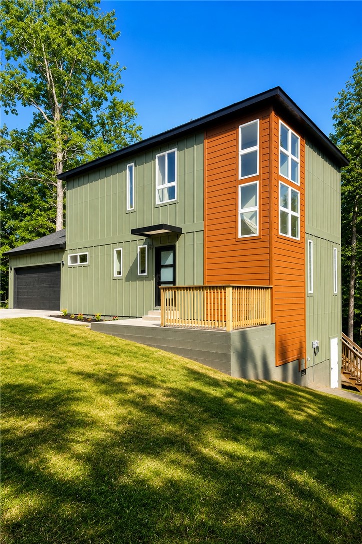 Best value in Bella Vista! Brand-new home just minutes from Bentonville, featuring 2 bedrooms, 2.5 bathrooms, and a versatile flex room perfect for a home office or guest room with closet. Enjoy an open-concept layout, oversized windows that fill the home with natural light, quality craftsmanship, and modern finishes throughout. Ideally located near world-class biking trails, golf courses, lakes, shopping, dining and Bentonville. Schedule your showing today!