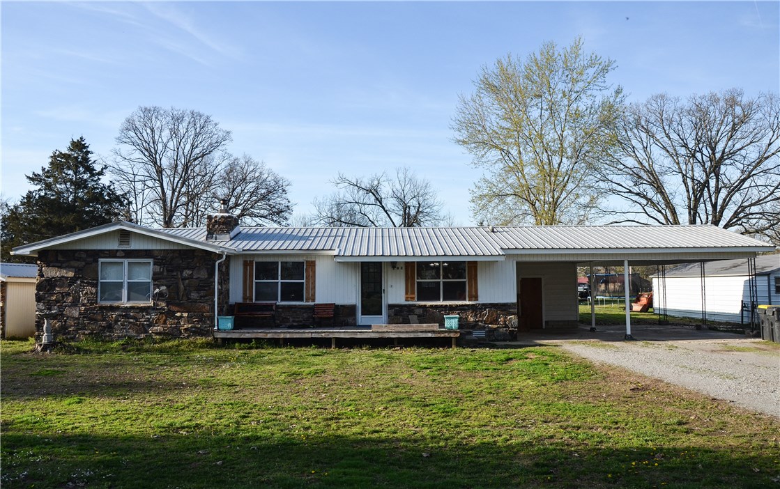 One of a kind gem on .86 acres in Elkins city limits! This house was fully remodeled down to the studs within the past 3 years! New/replaced items since 2016: HVAC, water heater, pex water lines, breaker box, entire kitchen, both bathrooms, flooring, laundry room with attached craft room, screened porch, deck, and so much more! Custom cedar accents throughout the home bring a unique and rustic feel. Super quiet neighborhood allows a secluded feel right in town! 2-10 Home Warranty conveys with property.