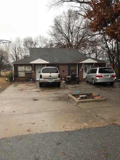 Newer HVAC in both sides. Left side is under a lease until end of July. Rent $600. Storage building conveys. Sold AS IS