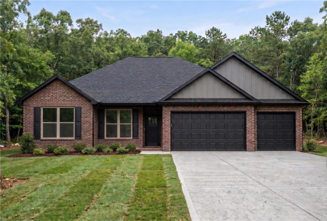 Welcome To Your Next Home At 20 Dunipace Drive! Just Underway And Ready For You To Make It Truly Yours. A Rare 3-Car Garage New Build In Bella Vista At This Price Point — Nobody Else Is Offering This, Period. We Have It, And Its Going To Be Fabulous. Step Inside To A Vaulted Living Space With Beam Treatment And A Fireplace That Makes A Statement. Custom Cabinets And Quartz Or Granite Counters That Run Throughout The Kitchen And Baths, No Shortcuts, No Exceptions. The Kitchen Features A Pantry, Tile Backsplash, Under Cab Lighting, Bar Seating, And Flows Seamlessly Into Dining And Living. Smart Split Floorplan Keeps The Primary Suite On Its Own Side With A Full Custom Tile Shower And Walk-In Closet. Covered Deck Out Back, Gravette Schools, And Close To Golf And All The Other Bella Vista Amenities You Love. This Is The House! This Is The Location! Get In Now And Spec Out Your Interior Finishes. **Exterior is a rendering; actual exterior finishes will vary. **Deeded as 2-bed septic; 3rd room is non-sleeping room.