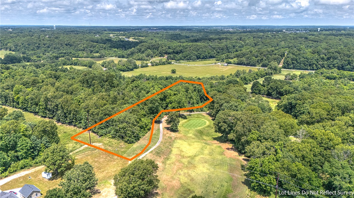 Nestled at the dead end of a quiet road in Pea Ridge, this beautiful golf course front lot offers the perfect blend of privacy, scenery, and opportunity. Overlooking the rolling greens of Big Sugar Golf Course, this is an ideal setting to build your dream home with peaceful views and room to spread out. This level 1.47 acre tract of land overlooks the golf course holes #4 & #5, located directly between two greens. Enjoy the feeling of seclusion while still being just minutes from conveniences in Pea Ridge and Rogers. Surrounded by impressive custom homes, this property offers a rare chance to create your own private retreat in one of the area’s most scenic settings. Big Sugar Golf Course is known for its dramatic elevation changes, challenging layout, and affordable public play, making it a favorite destination for golf enthusiasts across Northwest Arkansas.