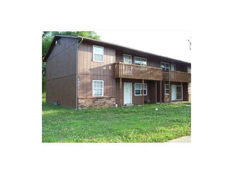 Wonderful investment opportunity! 2 bed, 1 bath 4-plex close to shopping, restaurants and I-49. All units currently leased month-to-month at $400 each. Newer windows. Additional insulation in the attic. On .46 AC on quiet cul-de-sac that backs up to,Springdale Country Club Golf Course.