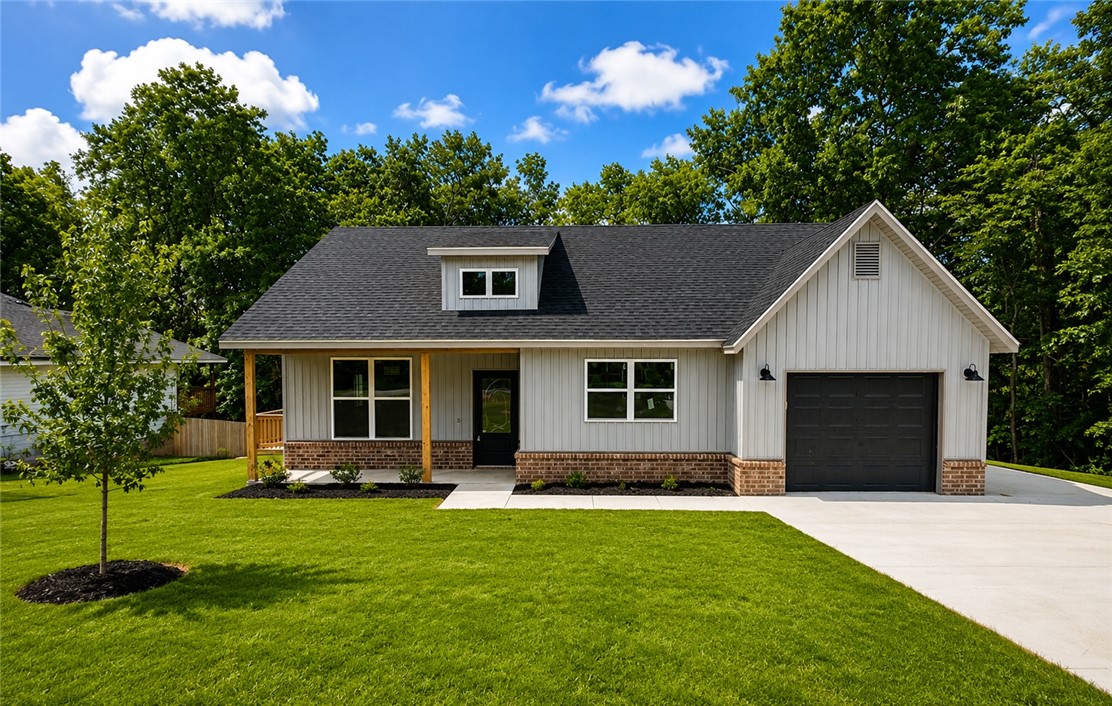 From the moment you step inside, you'll appreciate the thoughtful design and elevated finishes that make this new construction home stand out. Bright, inviting spaces are paired with durable luxury vinyl plank flooring, quartz countertops, and a spacious kitchen island designed for both everyday living and entertaining. The efficient layout maximizes comfort without unnecessary upkeep, making it an ideal option for those looking to spend less time maintaining and more time enjoying life. Located just a short distance from the Bella Vista Bypass, you'll have easy access to all that Bella Vista has to offer. Stylish, functional, and move-in ready, this home is proof that great design comes in all sizes.