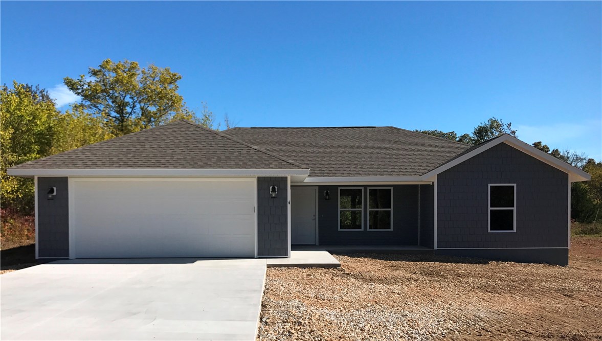 Pending contract before listed. Pictures of like property not actual house. 2 Br plus office in this New 1300 sq ft home with 2 Bath, 2 car garage, covered back patio/deck (depending on terrain). Laminate flooring and carpet, slate black appliances, Formica counters. Level lot to be rough graded only.  Gas log fireplace - NO propane tank to be provided. Home estimated completion date Jan 31, 2020