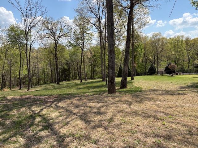 Located in the desirable Clear Creek community, this .65 acre estate lot offers a beautiful cul-de-sac setting with a great building site, surrounded by mature trees for added privacy in a peaceful setting. Enjoy a highly sought-after location within a gated golf community with private security.