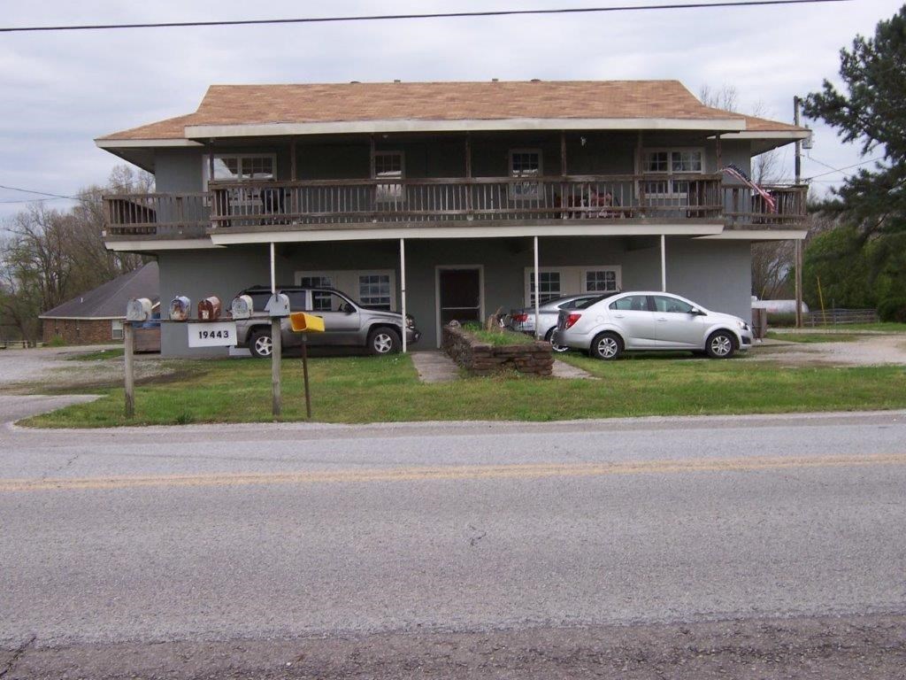 Exceptional investment opportunity! This currently rented four-plex is near the lake marina & State Park. Buy now before area is revitalized & prices soar!