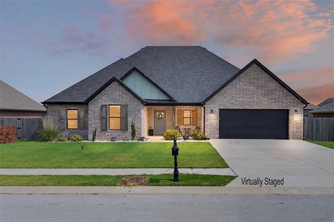 Located in Tontitown known for its annual Grape Festival, historic winery, and some of Northwest Arkansas' favorite Italian restaurants. This home features 5 bedrooms and 3 full bathrooms, including 4 bedrooms and all 3 baths on the main level, plus an upstairs bonus room that can easily serve as a fifth bedroom, media room, home office, playroom, or second living area. The layout includes a spacious living room with a gas fireplace, a dining area overlooking the backyard, and a well-appointed kitchen with a large island, ample seating, and plenty of workspace. Just off the garage, you'll find a generously sized laundry and mudroom that adds everyday convenience. Step outside to enjoy the large, fully fenced backyard, covered patio, and detached storage shed. Additional updates include a new roof installed in October 2025. Neighborhood amenities include a community pool, pavilion, and playground. Conveniently located just minutes from I-49, Arvest Ballpark, Tontitown Winery, Arkansas Children's Hospital.