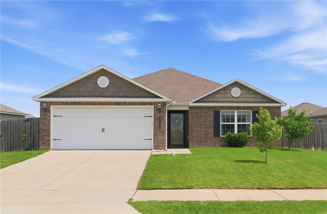 Welcome to 2312 Hickory Wood Avenue in the desirable Lakewood neighborhood! Built in 2019, this well-maintained 3-bedroom, 2-bathroom home offers 1,480 square feet of comfortable living space in a prime Rogers location. The open-concept floor plan features a spacious kitchen with granite countertops, recessed can lighting, and ample cabinet space, making it perfect for everyday living and entertaining. The private primary suite includes a walk-in shower and generous closet space, while both bathrooms feature cultured marble countertops. New flooring and carpet adds a fresh touch throughout the home. Conveniently located near Mt. Hebron Park, Janie Darr Elementary, shopping, dining, and other everyday amenities, this move-in-ready home offers the perfect blend of comfort, style, and convenience. Don't miss your chance to own this beautiful home in one of Rogers' most sought-after areas!