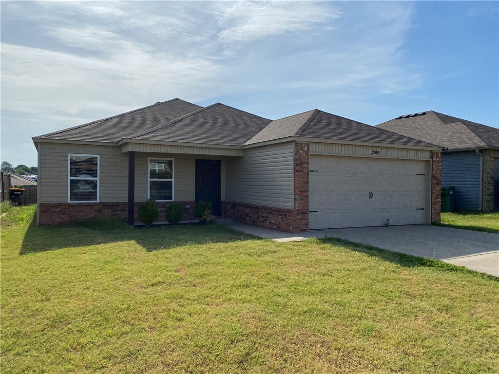 Three bedroom two bath home with a two car garage ready to move in.  This home features a large open living area and a spacious primary suite.