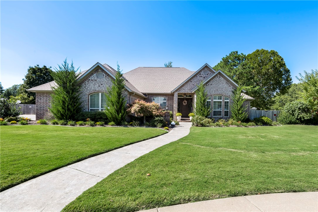 This beautifully finished home actually has it all! Inside, outside and the LOCATION couldn't be better! Updated kitchen, wood floors, big primary suite with fireplace, amazing layout for privacy, media room, two flexible formal rooms PLUS the living room off of the eat-in kitchen, AND an office with built-ins, 5 bedrooms, 4.5 bathrooms, walk-in closets, amazing heated and cooled storage upstairs, HUGE screened entertainers' patio, heated pool, GREAT oversized lot, shed, storm shelter... all of this in ONE property that is close to ALL Bentonville has to offer.