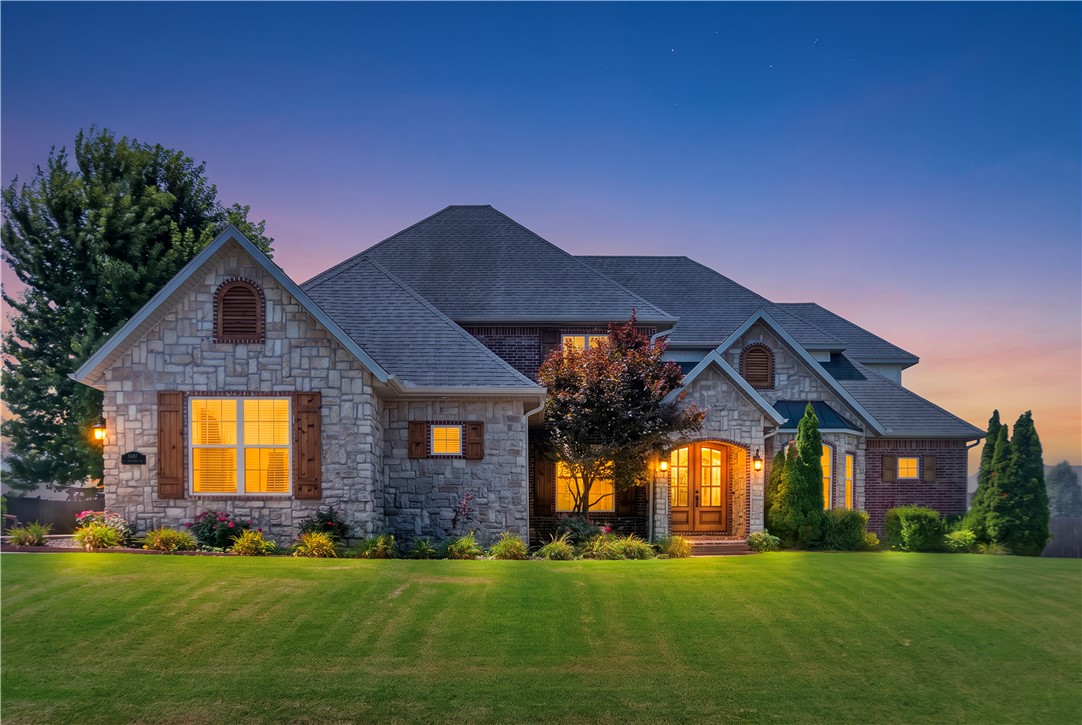Welcome to this beautiful home in the desirable Overton Park neighborhood of East Fayetteville, conveniently located just minutes from Uptown Fayetteville and I-49. Situated on a spacious, level .69-acre lot, this home features brand-new Hardie board siding, fresh interior paint, updated bathrooms and lighting, and a new water heater. The thoughtfully designed layout offers a formal dining room, dedicated office, inviting living room, and a cozy family room just off the kitchen. The spacious primary suite includes a generous bathroom and walk-in closet. Upstairs, two bedrooms share a Jack-and-Jill bathroom, while two additional bedrooms share another full bath. An open balcony overlooks the living room below, adding character and natural flow. Outside, the extended concrete patio and pergola create a wonderful entertaining space, while the level backyard offers plenty of room for a future pool. Complete with a three-car garage, this move-in-ready home is waiting for its new owners!