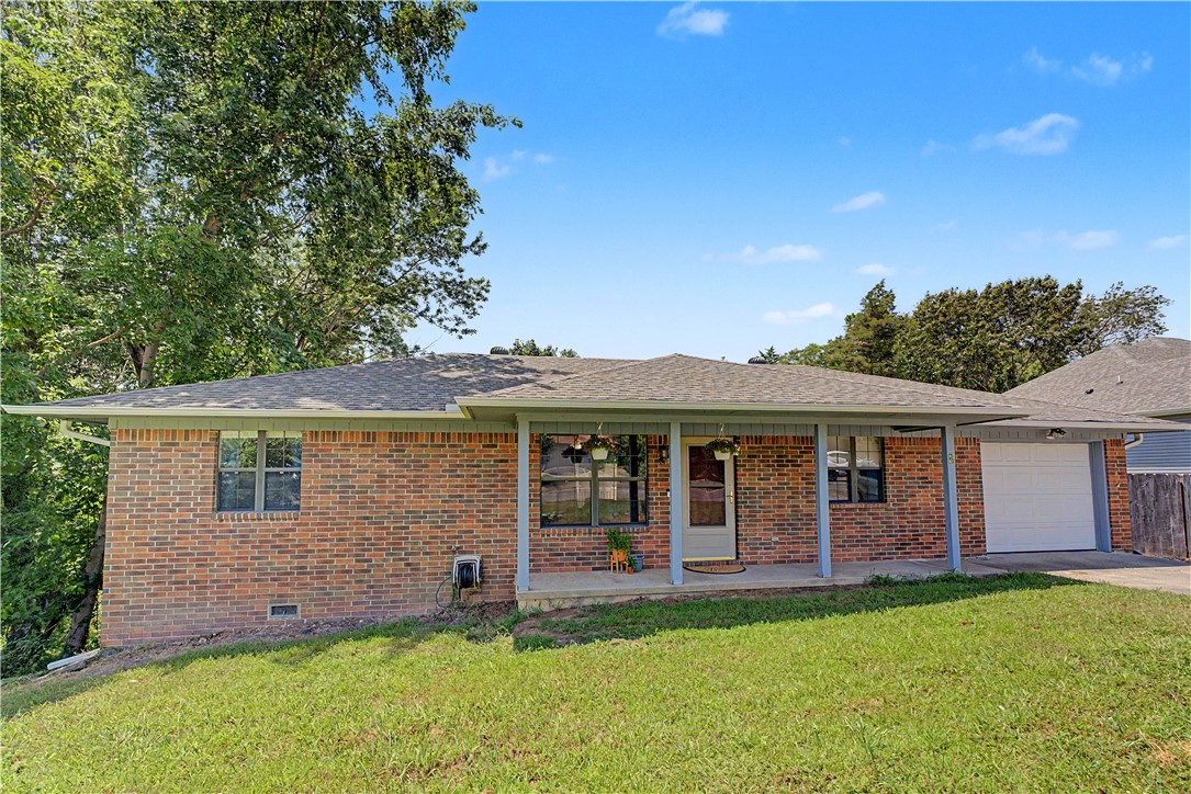 Affordable, well maintained home on oversized lot in Bella Vista is ready and waiting for its new owners. Perfect for 1st time home buyers or those looking to downsize. This charming home is move in ready home comes with a refrigerator, washer, dryer and TV. The kitchen even has a built in sitting area. The backyard is amazing with a great size deck and privacy fence with ALL the room for entertaining and outdoor fun. A new roof was installed within the last 3 years, along with new gutters with gutter guards. Crawlspace has recently been encapsulated.