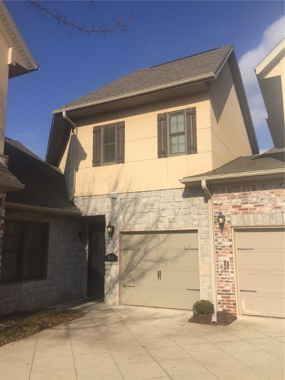 Executive 2 bedroom condo in the heart of Rogers. Each bedroom has full bath with half bath on first level. One car garage with nice patio deck.