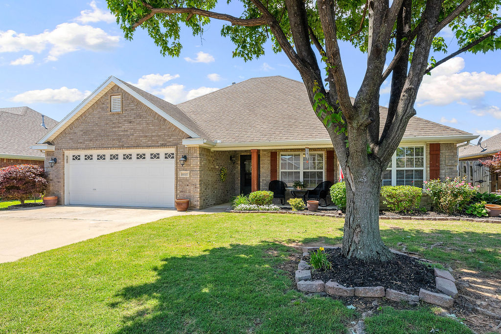 Charming Remodeled Home in SW Rogers Desirable Subdivision! Welcome to your dream home! This remodeled gem is nestled in a sought-after subdivision, just steps away from the Razorback Greenway! Enjoy the convenience of nearby shopping, dining, Walmart Amp, Top Golf, schools, businesses and quick access to I49.  Are you looking for Move-in-Ready...in 2022 this single-level home updated flooring thru out including bathrooms, completely re-painted, added granite & quartz countertops, re-did both bathrooms including sinks & toilets, hardware and fixtures, added a stone accent wall to fireplace and epoxied the garage floor! The beautifully landscaped yard complete w/ a covered porch and patio, ideal for relaxing or hosting gatherings. Additional amenities include a crown molding, tray ceilings, storage building and a fenced yard. Don't miss the opportunity to make this charming home your own!