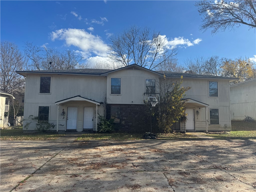 Outstanding investment opportunity in Fayetteville featuring three 4-plex townhome buildings totaling 12 units along N Betty Jo Dr. Each unit offers 2 stories, 2 bedrooms, 1.5 baths, and approx. 1,024 sq ft, a highly rentable layout in this market. Seven units are recently vacant and have been refreshed with new paint and minor interior repairs, allowing immediate marketing for lease at market rent. Five units remain occupied, providing a set rent income from day one. Current average rent is $970/unit. Located near the University of Arkansas, major employment centers, and popular Fayetteville amenities, this property is positioned for long-term appreciation and stable occupancy. Rare chance to acquire three quadplexes totaling 12-units as a value-add asset with both instant cash flow and significant future potential. Ideal for investors seeking scale in Northwest Arkansas. Being sold as-is. Single 4-plex cross listed MLS: Units 526-532: 1329355; Units 514-520: 1329353; Units 500-506: 1329350
