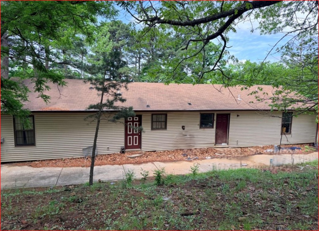 Duplex across from Cliff House Restaurant in Jasper. So many possibilities to make an Airbnb, two small rentals or live in one side and rent out the other side. Covered porch along back side of home. Between Jasper and Deer. Buffalo River nearby. Property will need updating. Seller doesn't know if CH/A is working. Selling AS-IS. Property will not go VA, RD or FHA. All numbers approximate. Age and sq ft per Assessor's office.