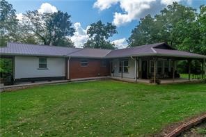 Park like setting with creek access. Fenced and cross fenced property featuring 2200+ sq ft home and detached barn.