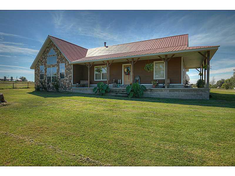 6 ponds, dairy brn, horse brn 2 tack & bathrm, hay brn, 2 chicken hses (1 operational), 1 bed cabin, all w/elec and water, shop wired w/220, gen purpose brn w/elect, corrals w/head chute, pole barn, hay barn w/ elec, holds over 400 bales,rodeo arena w/7 lights, press box, running/roping chutes, pavilion, pond w/waterfall, garage attic is floored w/ stairs, covered patio behind garage. Wood burning cook stove does not convey.